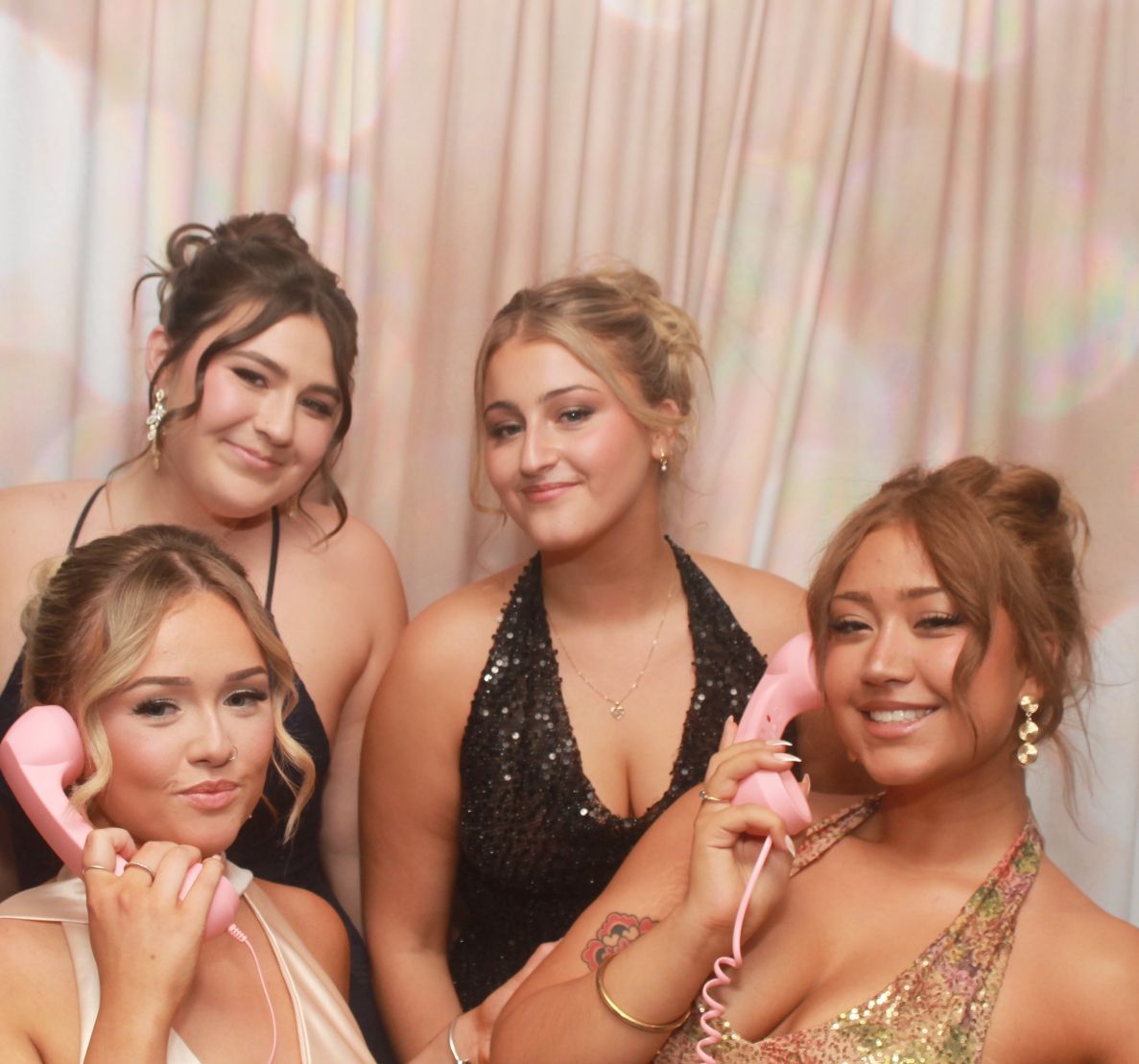 4 girls in the photo booth Central Coast