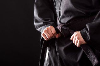 Tying The Knot Of His Black Belt — Richmond, KY — Richmond School of Karate