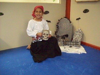Girl Holding A Skull — Richmond, KY — Richmond School of Karate