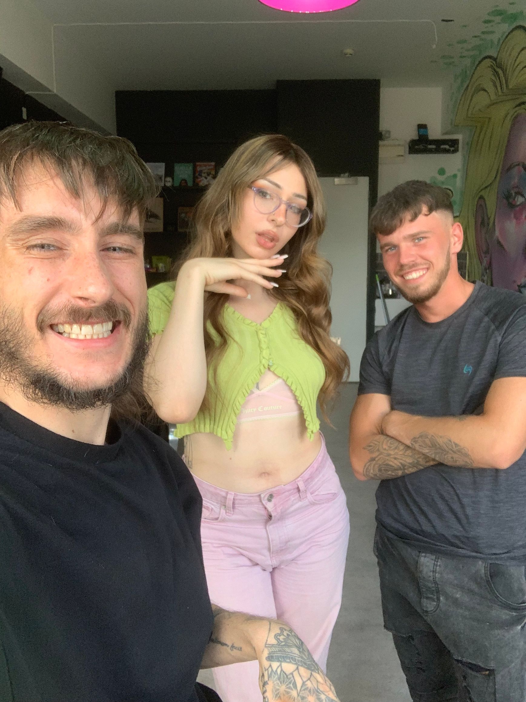 A client are posing after having a balayage and a WEFT extension install.