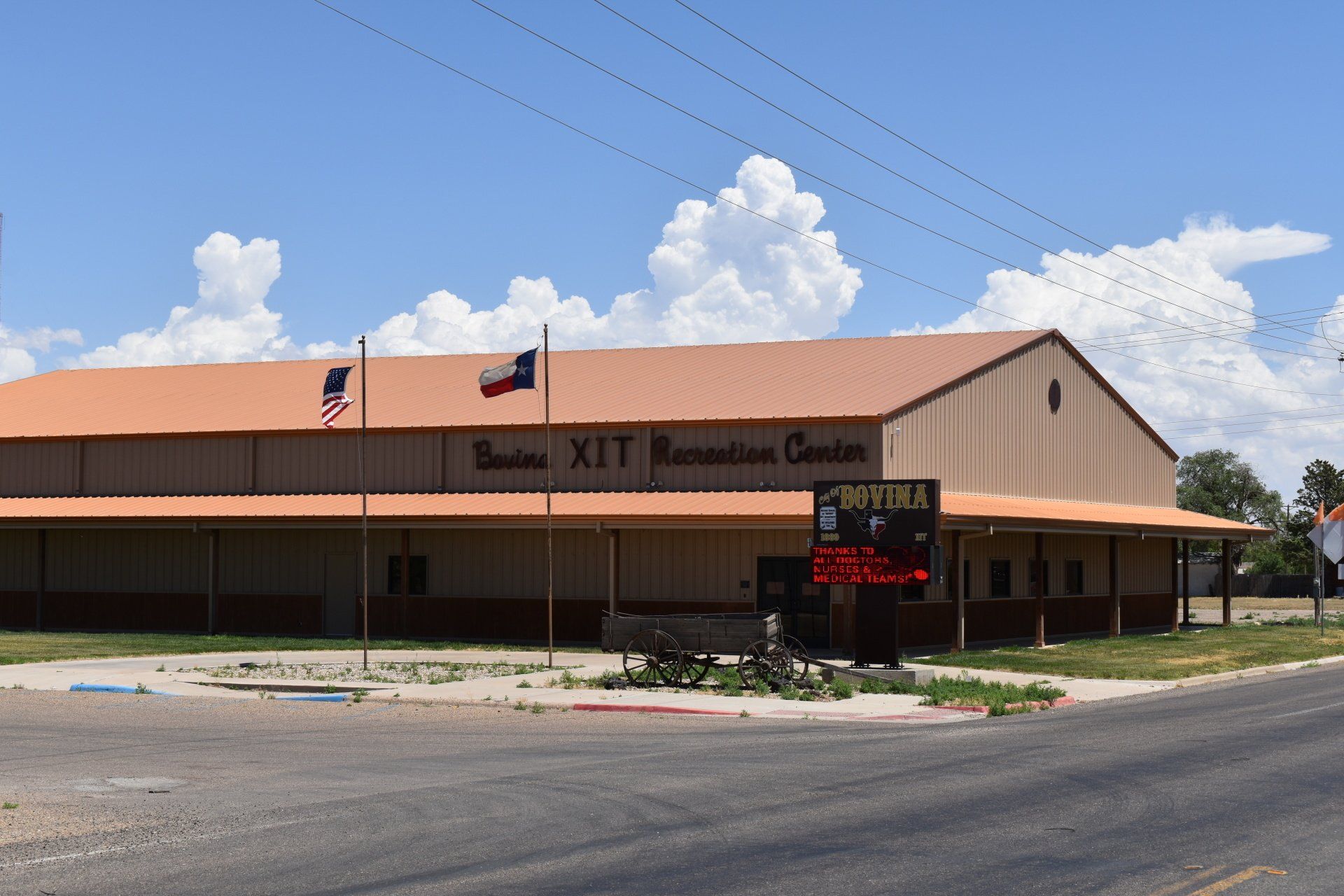A large building with a sign that says wanted on it