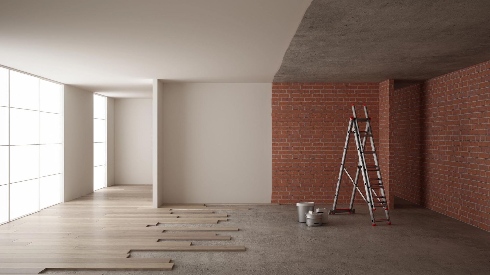 Uno spazio in transizione, con un lato rifinito in bianco e pavimenti in legno chiaro, e l'altro a vista con mattoni e cemento.