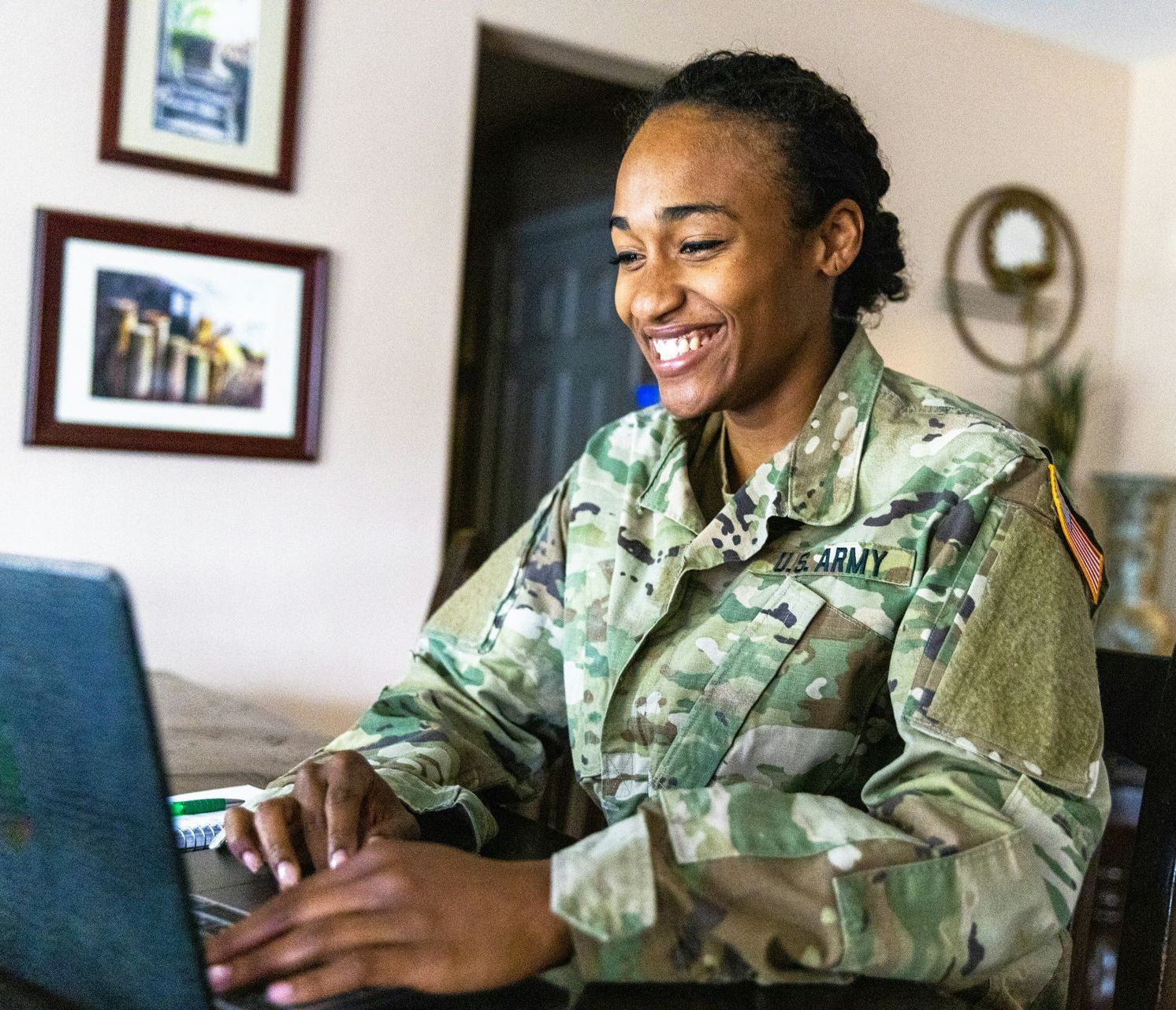 A man and woman are holding a baby in their arms.