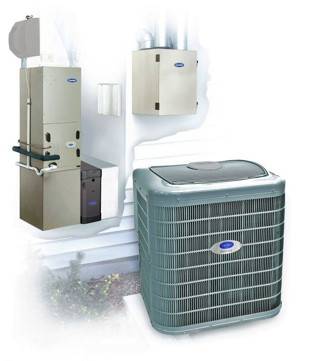 Three gas furnaces in a utility room, with silver ductwork, pipes, and gray storage.