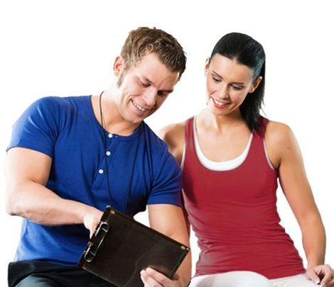 A man and a woman are looking at a clipboard together