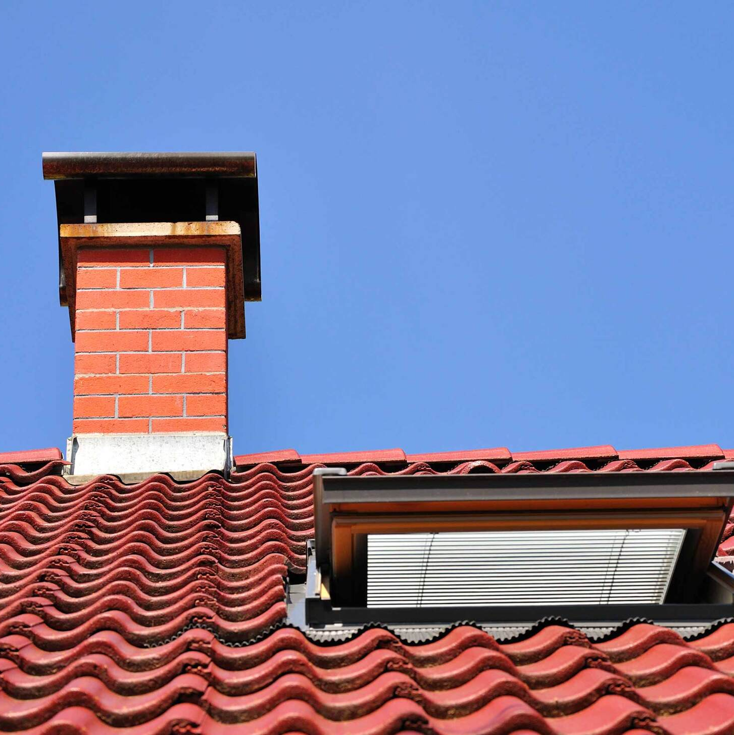 Red Roof With Chimney — Worcester, MA — Emener Chimney Maintenance Inc.