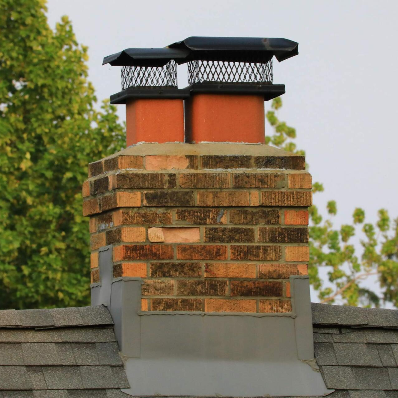 Chimney With Weather Cover — Worcester, MA — Emener Chimney Maintenance Inc.