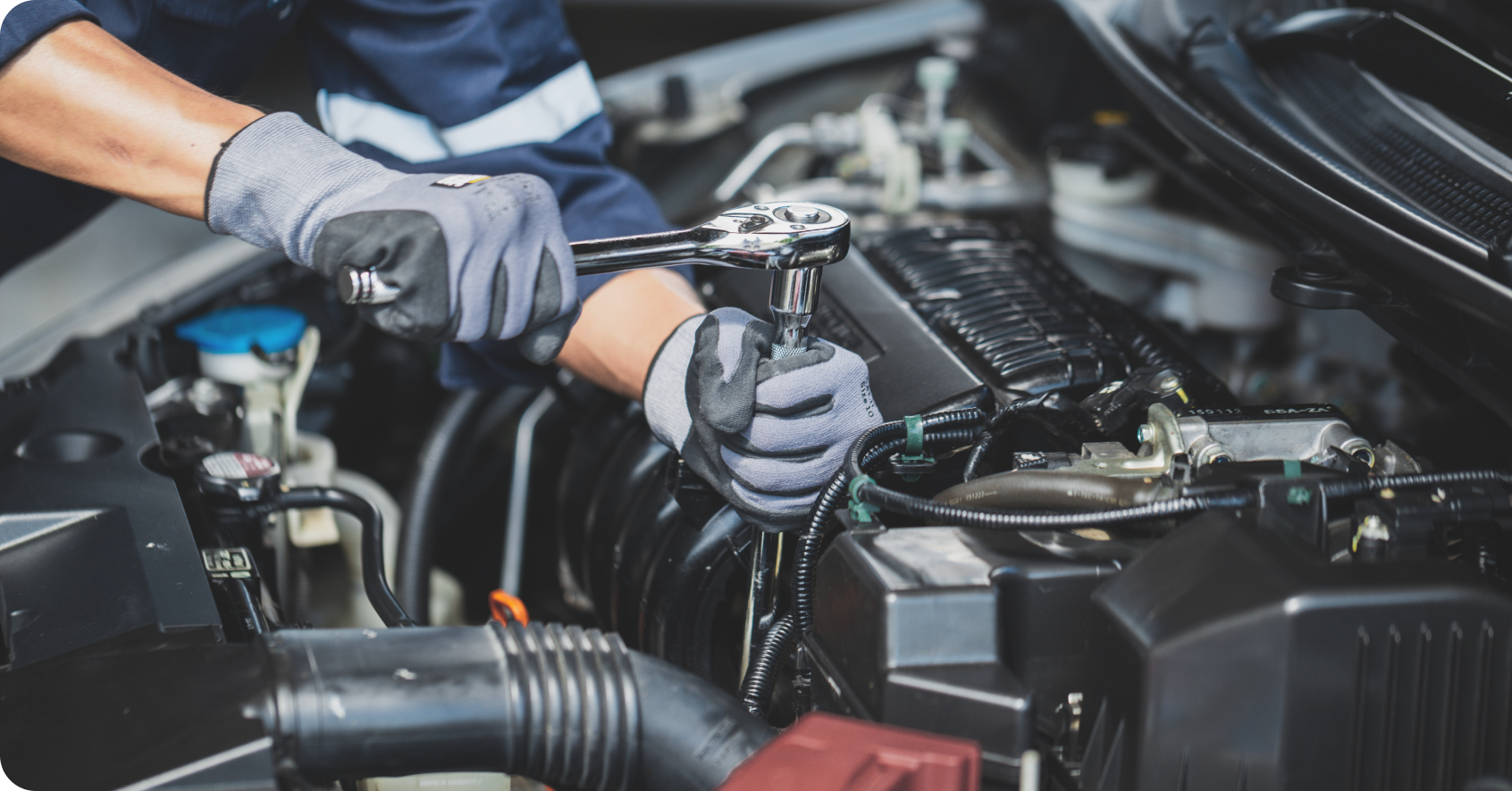 Mechanic Working  on Car | Amigo Auto Repairs
