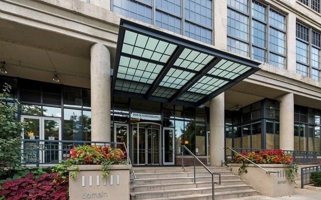 A large building with a canopy over the entrance