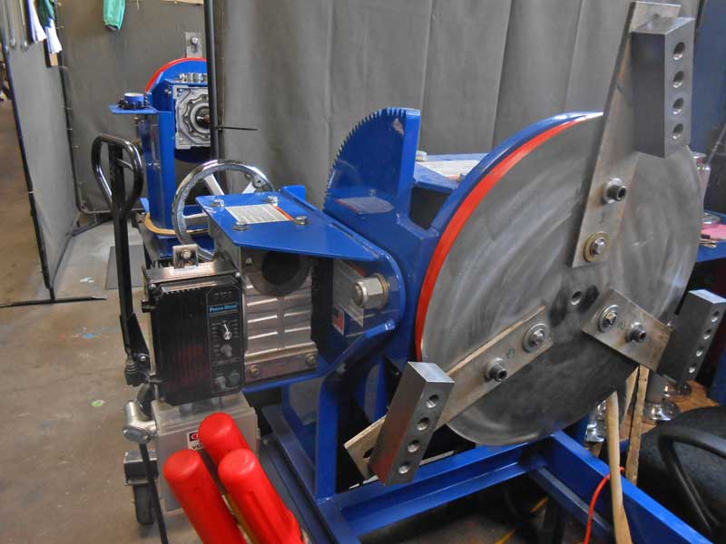 A blue machine with a red stripe on it