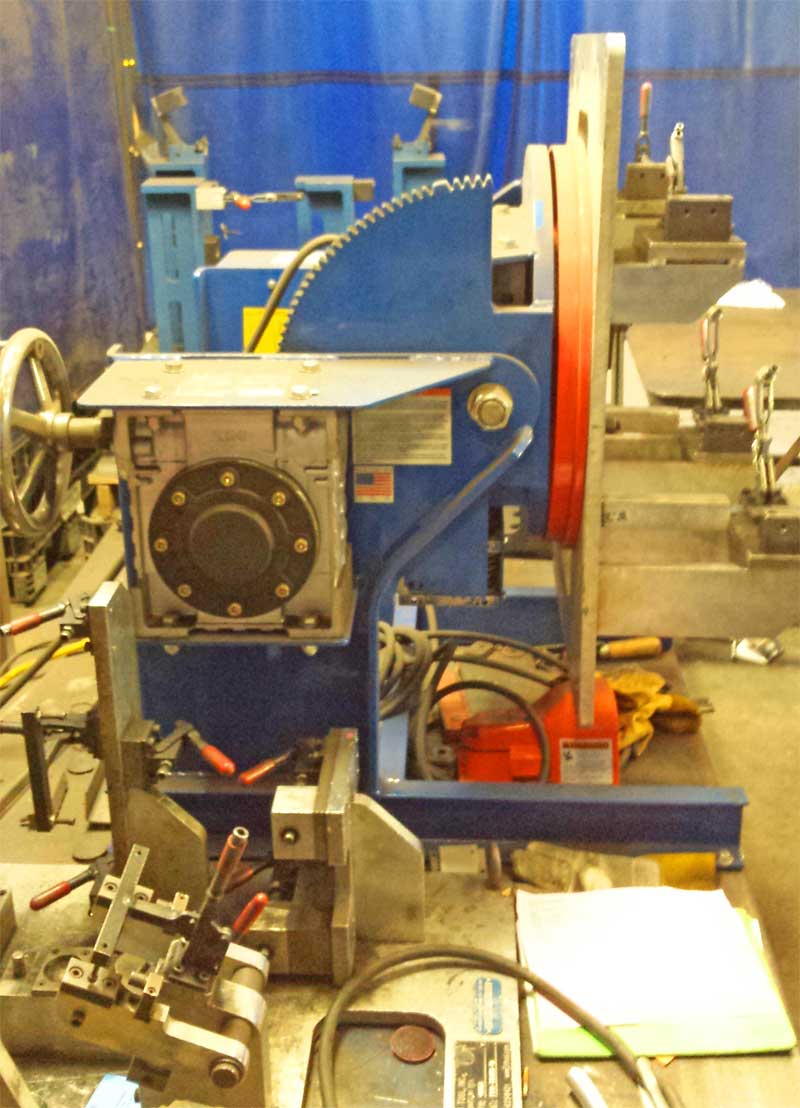 A blue and red machine is sitting on a table