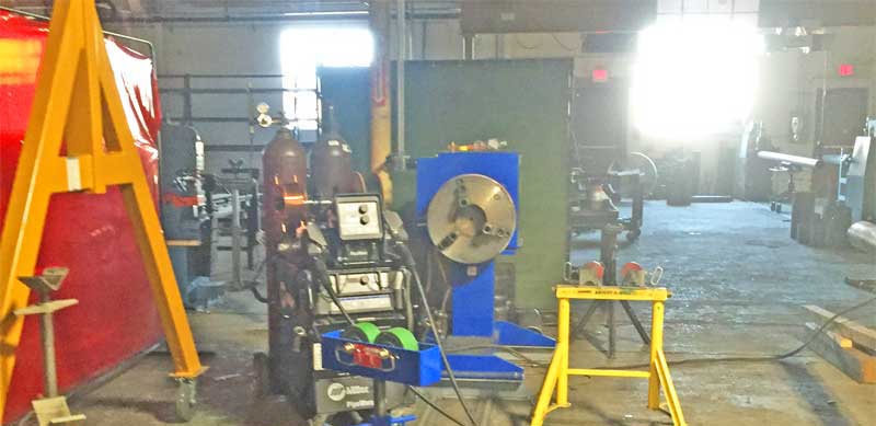 There is a welding machine in the middle of the room.