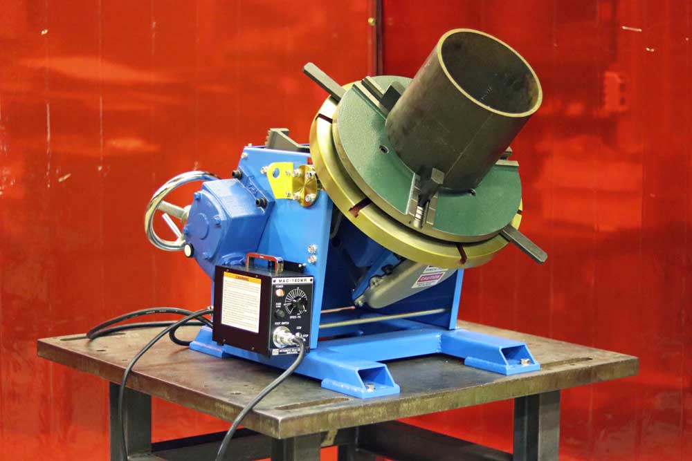 PS-3F Benchtop Welding Positioner Shown with Optional MAC WP-400 Welding Chuck holding a workpiece.
