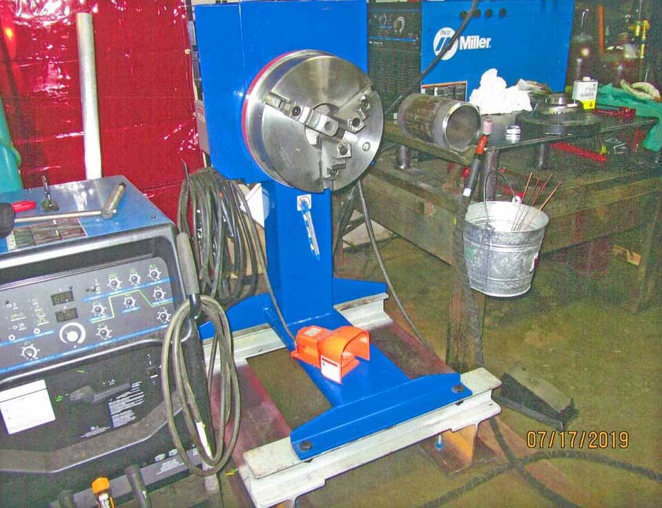 A miller welding machine is sitting on a table