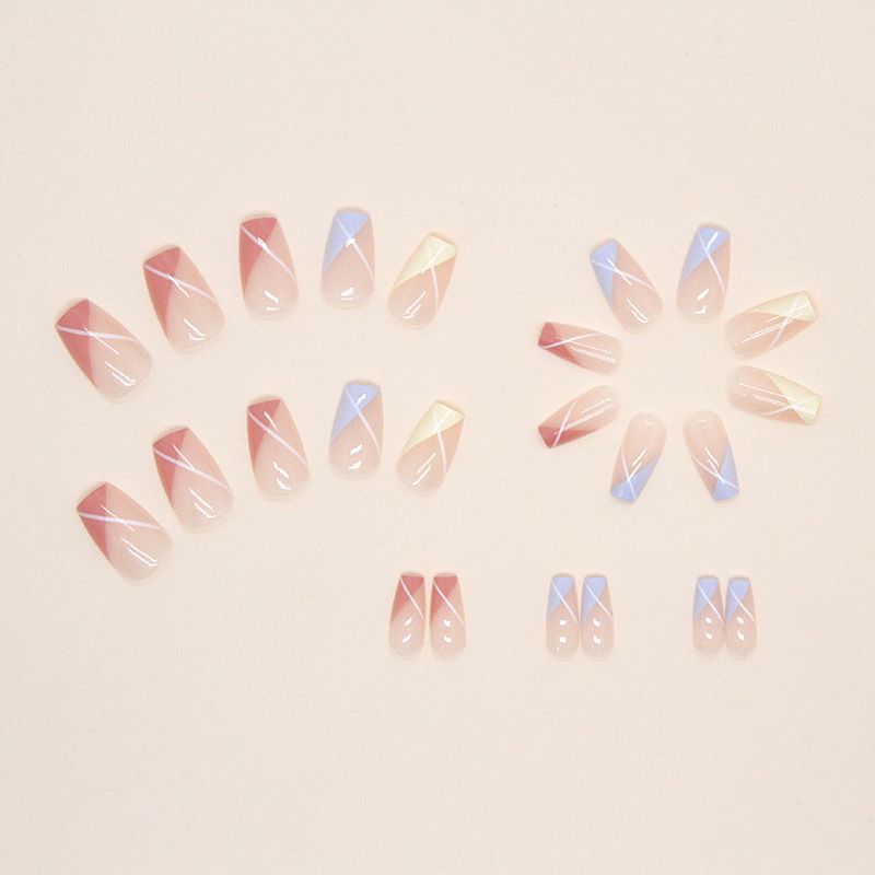 A close up of a person 's nails with a french manicure.