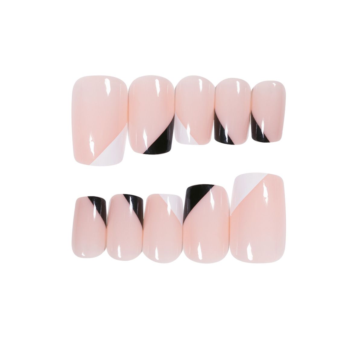 A close up of a woman 's nails with a ring on her finger