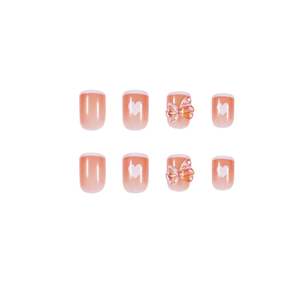 A close up of a person 's nails with a bow on them.