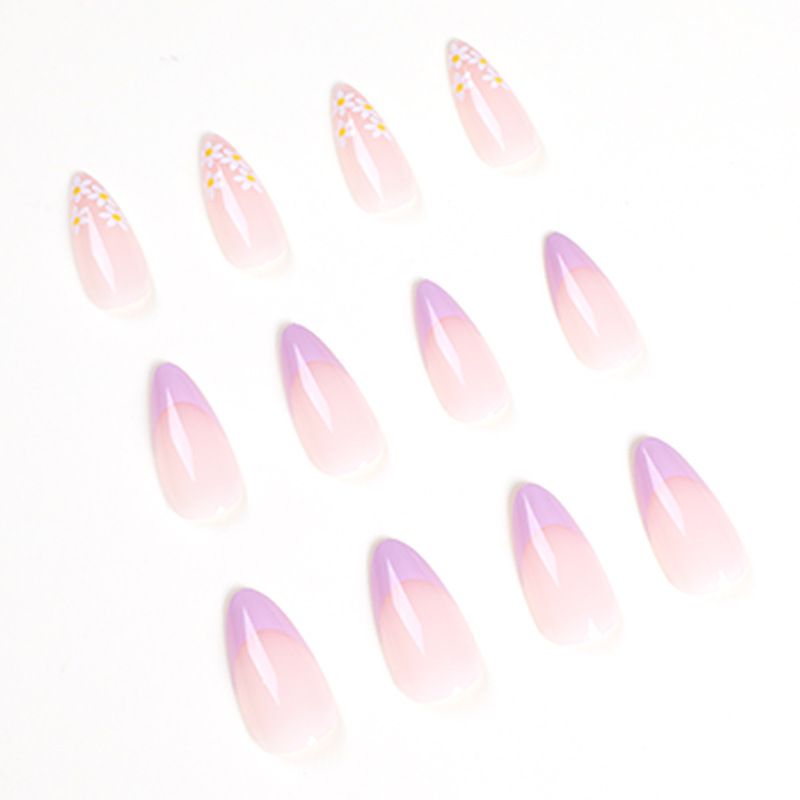 A close up of a woman 's hand with rings on her fingers