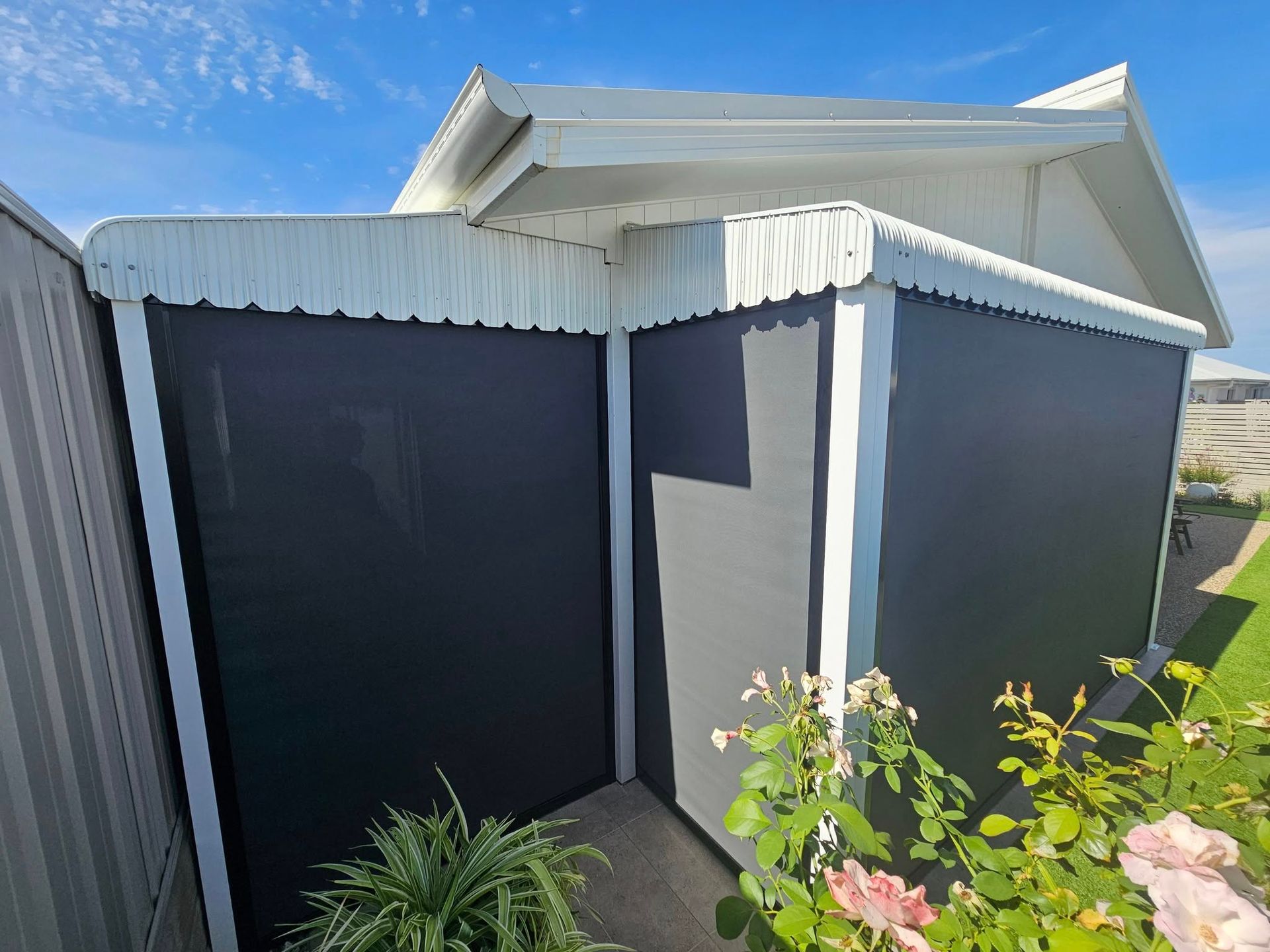 A Large White Awning Is Over A Swimming Pool — Modern Window Furnishings In South Kolan, QLD