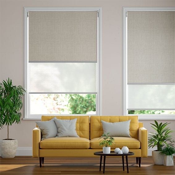 A Pair Of Roller Blinds Hanging On A Window Next To Stairs — Modern Window Furnishings In Woodgate, QLD