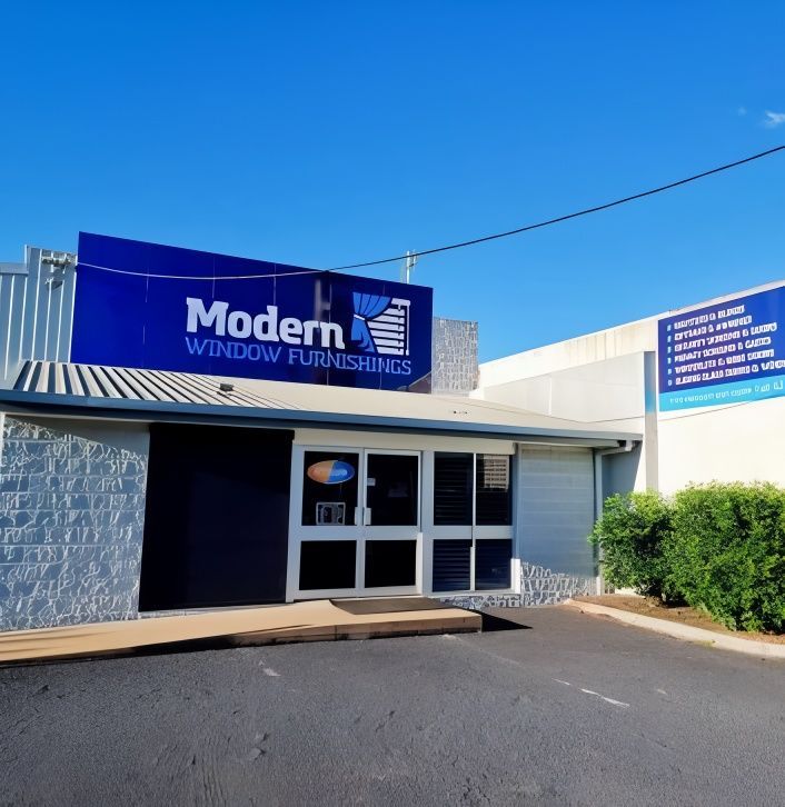 A Building With A Blue Sign That Says Modern Window Furnishings — Modern Window Furnishings In Bundaberg East, QLD