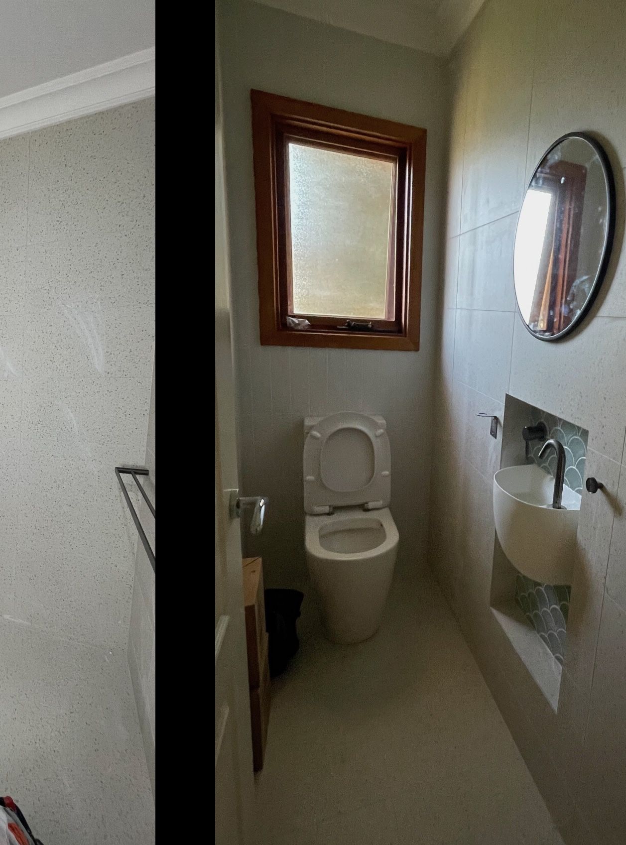 A bathroom with a toilet a sink and a mirror