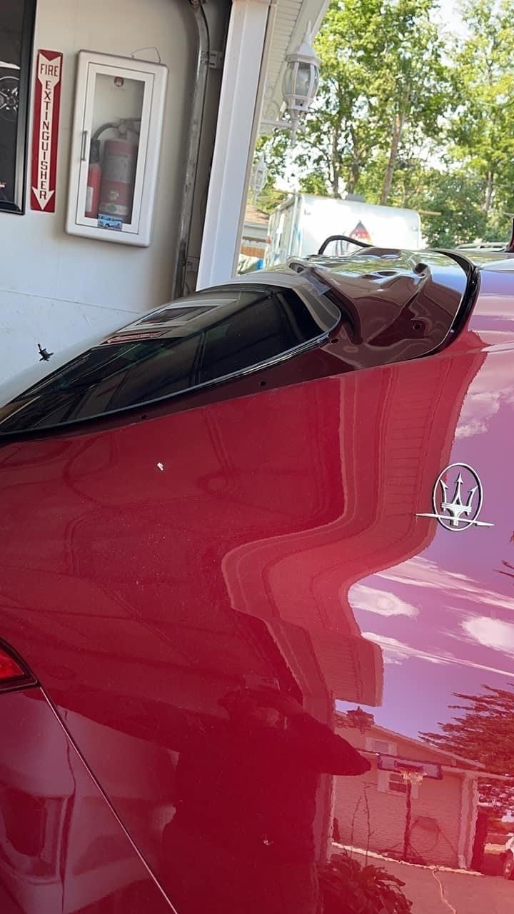 Back Glass of a Red Car — Chicago, IL — Sotelo Auto Glass Service