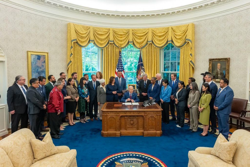 Signing of Berryessa Snow Mountain National Monument Expansion act with, Tuleyome Executive Director, Sandra Schubert, second from right in front row.