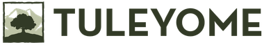 A logo for tuleyome with a picture of a tree