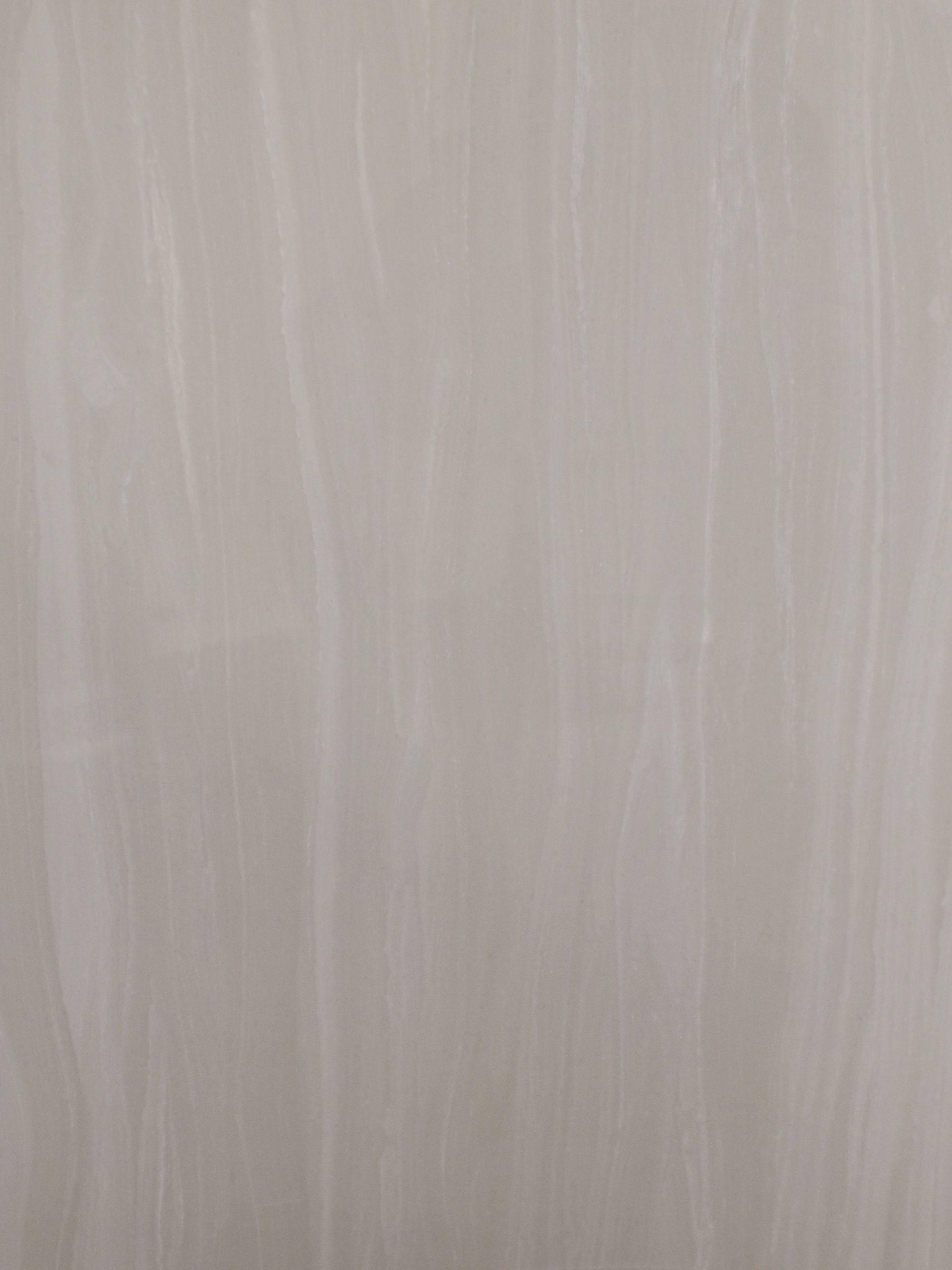 A close up of a white fabric texture.