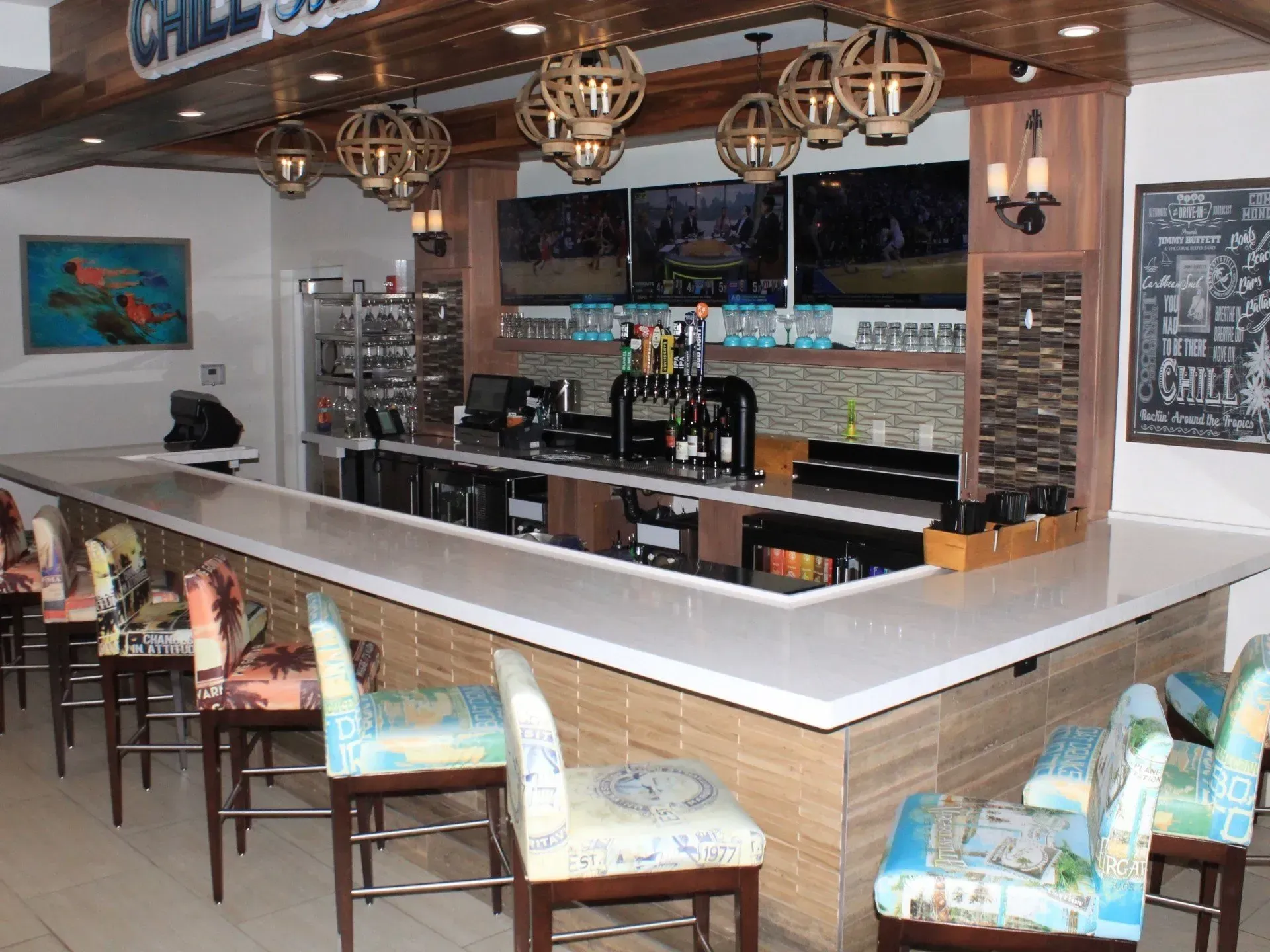 A long bar with a sign that says chill on it