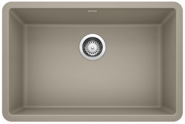Tan rectangular kitchen sink with a circular drain in the center.