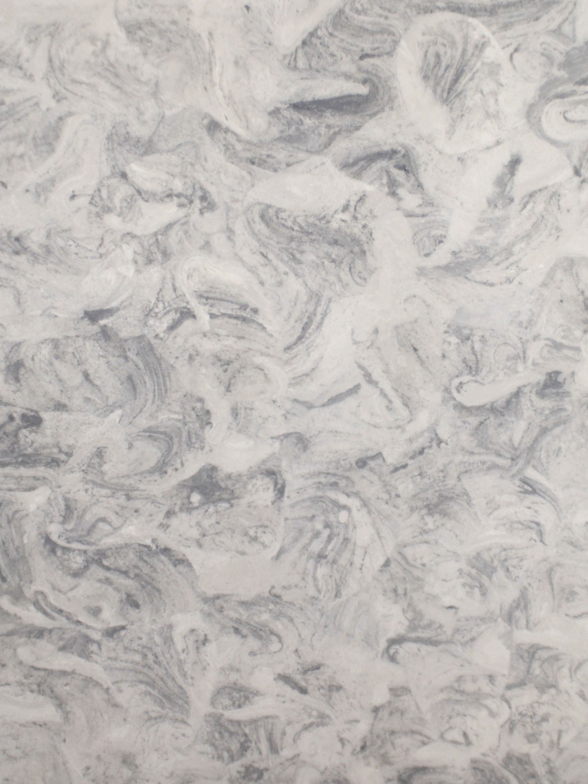 A close up of a white and gray marble texture.