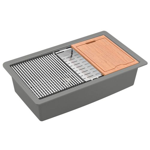Gray kitchen sink with integrated accessories: metal grate, colander, wooden cutting board.