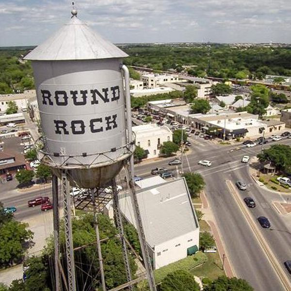 Round Rock, TX water tower and downtown area – Stetson Property Management local experts.