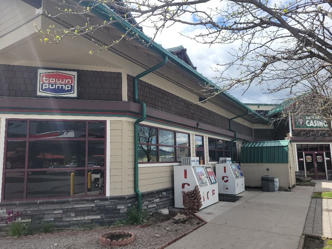A building with a pepsi sign on the side of it