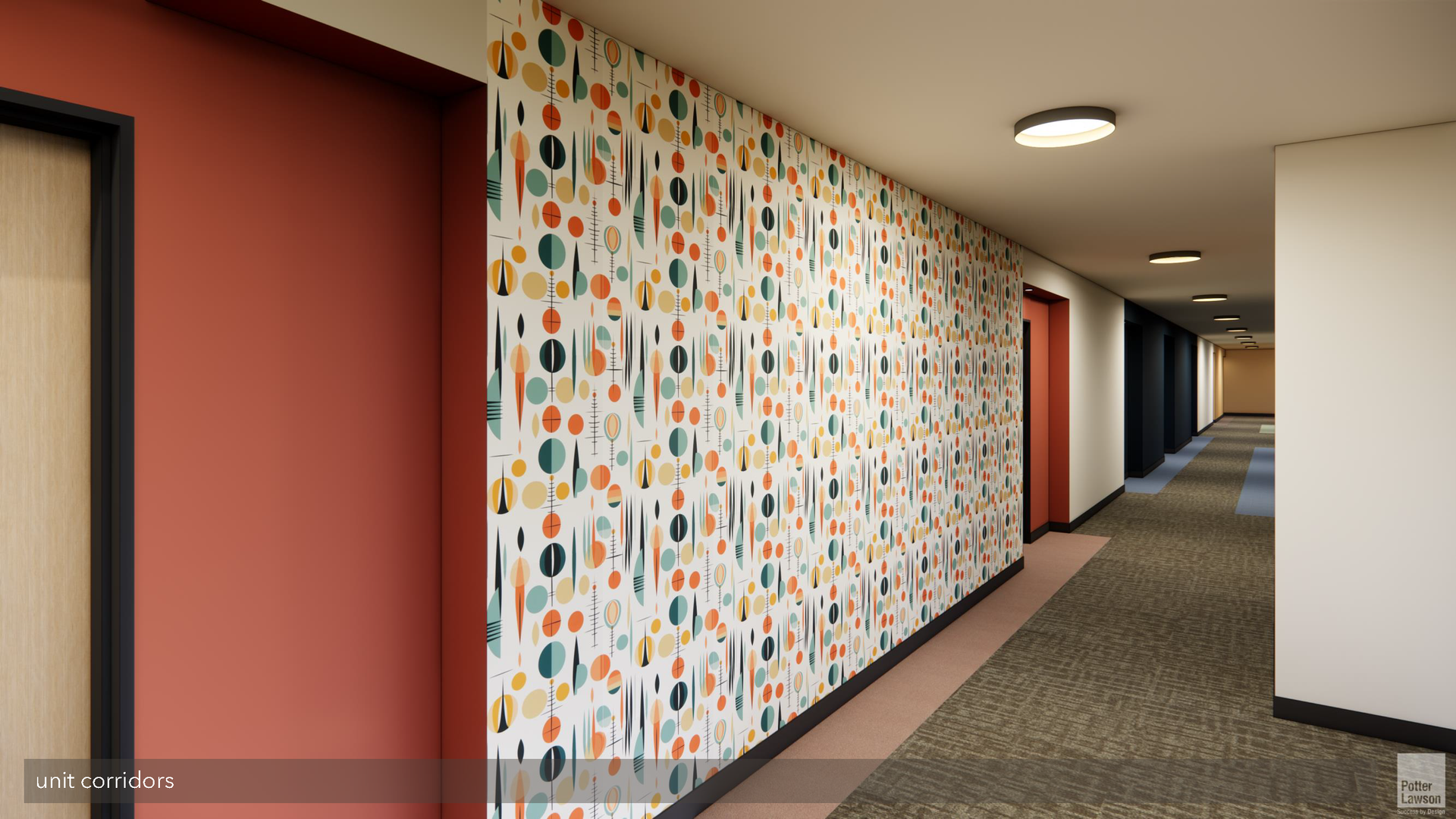 Long hallway with colorful patterned wall, red accent walls, and overhead lights in a modern building