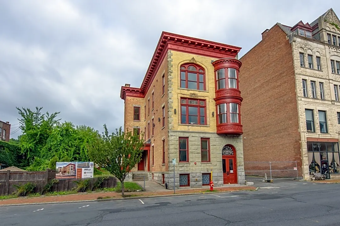 Remsen building photo - yellow and red building