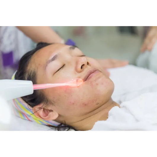 someone having an electro facial done