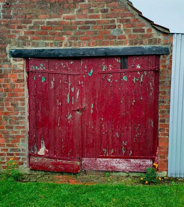 Side-hinged garage doors