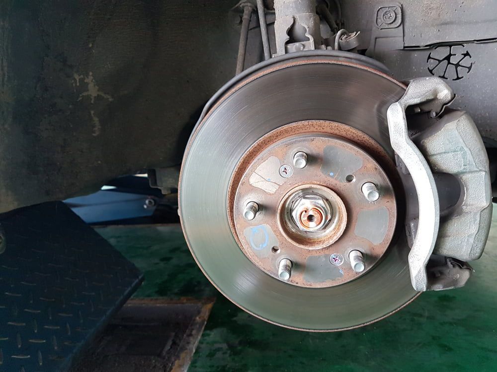 A Close Up Of A Brake Disc On A Car — COOTA Automotive Services In Ballarat East, VIC