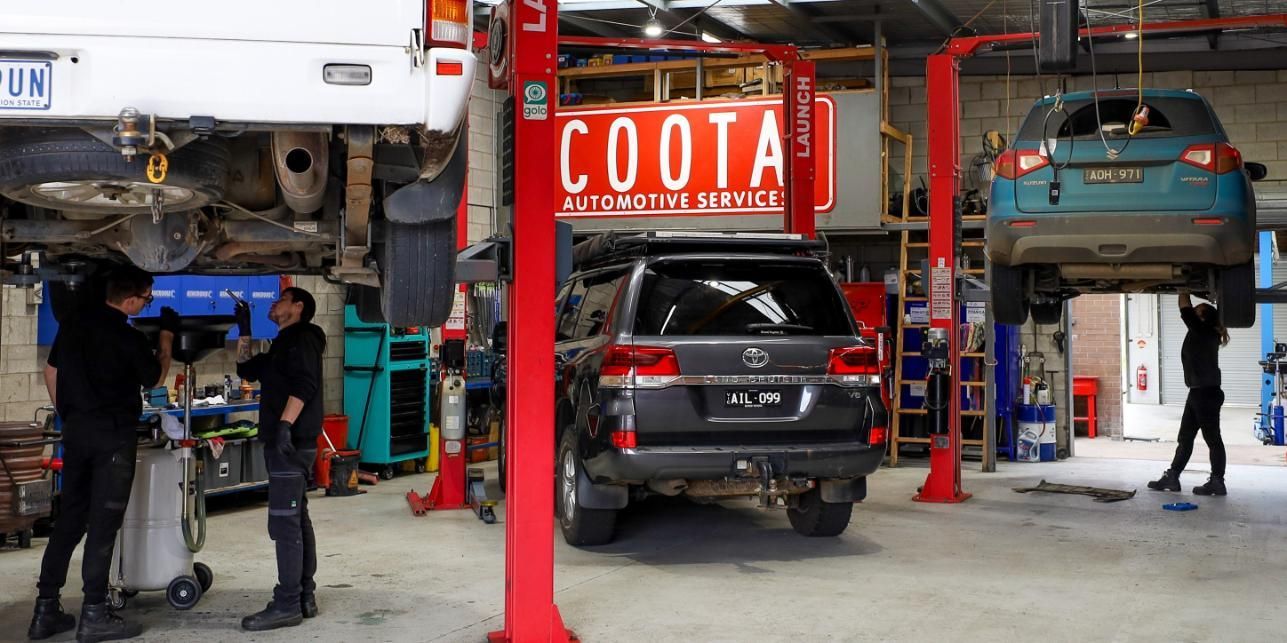 A Garage With A Sign That Says Coota On It — COOTA Automotive Services In Ballarat East, VIC