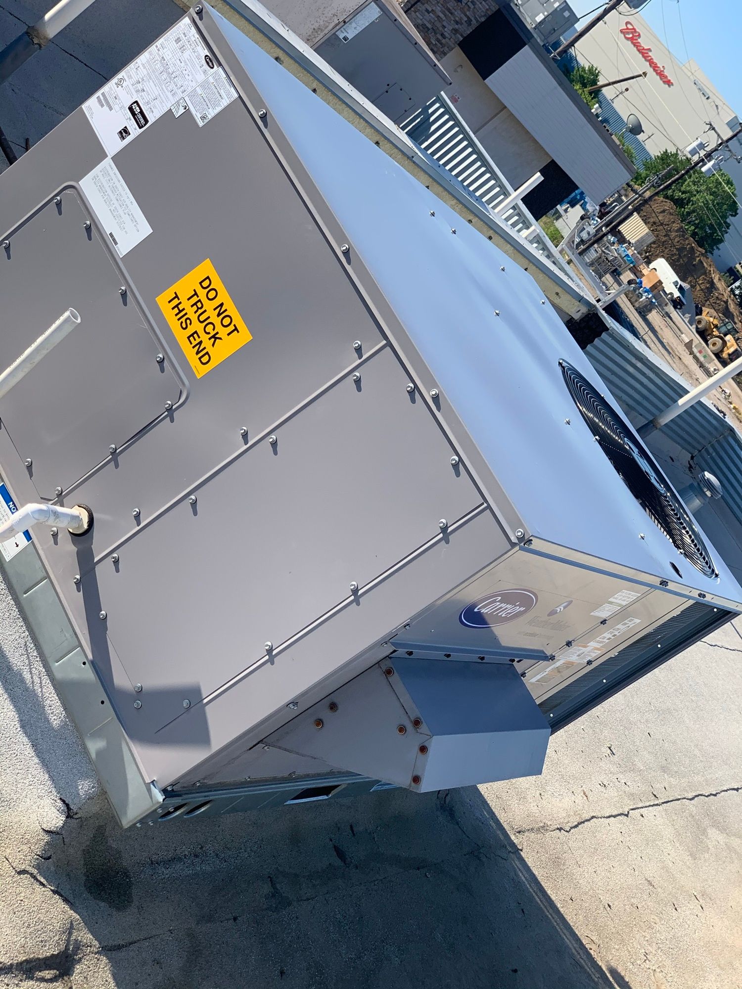 a box with a yellow sticker on it that says do not touch