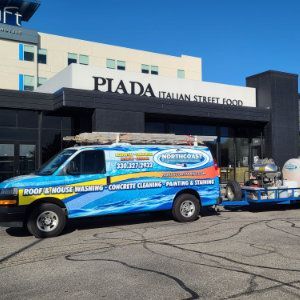 Before and after commercial building exterior pressure washing