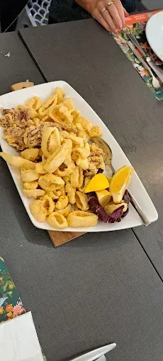 frittura di pesce per una cena economica a Bergamo