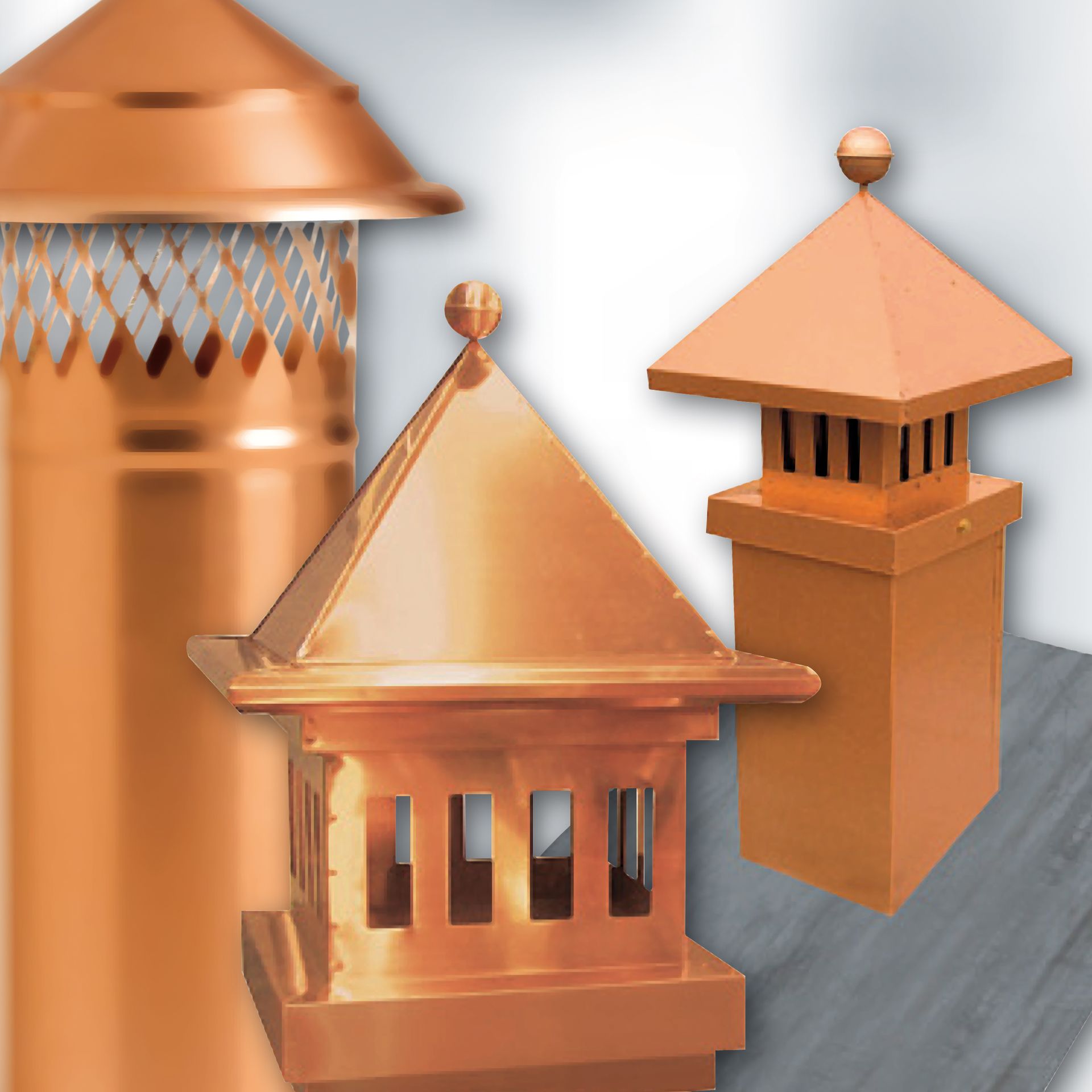 Un gruppo di camini in rame con uno sfondo bianco