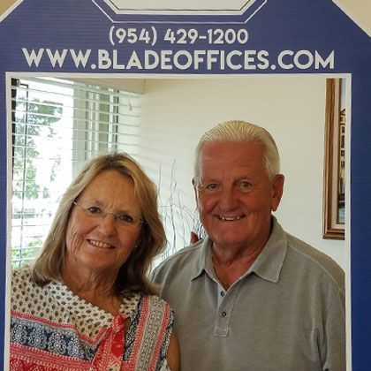 Senior Couple Posing for a Picture | Deerfield Beach, FL | Blade Title Company