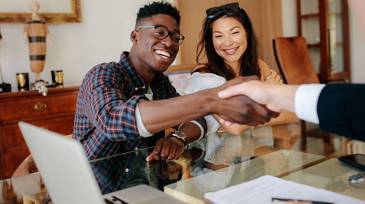 Couple and Financial Adviser | Deerfield Beach, FL | Blade Title Company