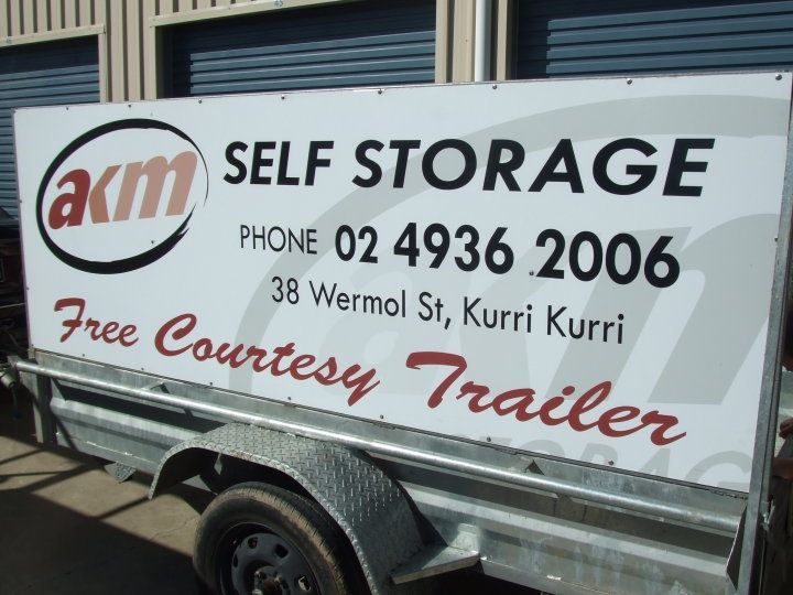 A Group of Cardboard Boxes Stacked on Top of Each Other — AKM Self Storage In Kurri Kurri, NSW