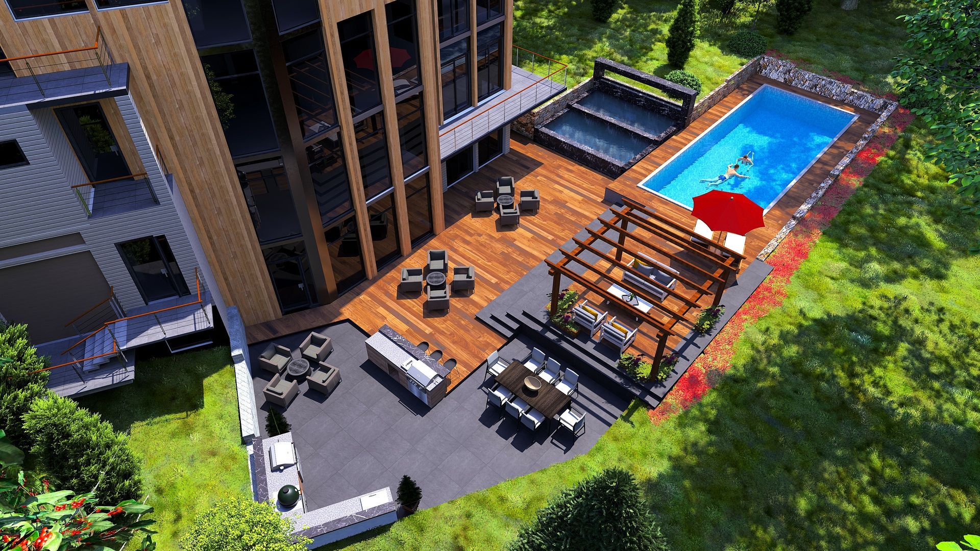 An aerial view of a house with a large swimming pool in the backyard.